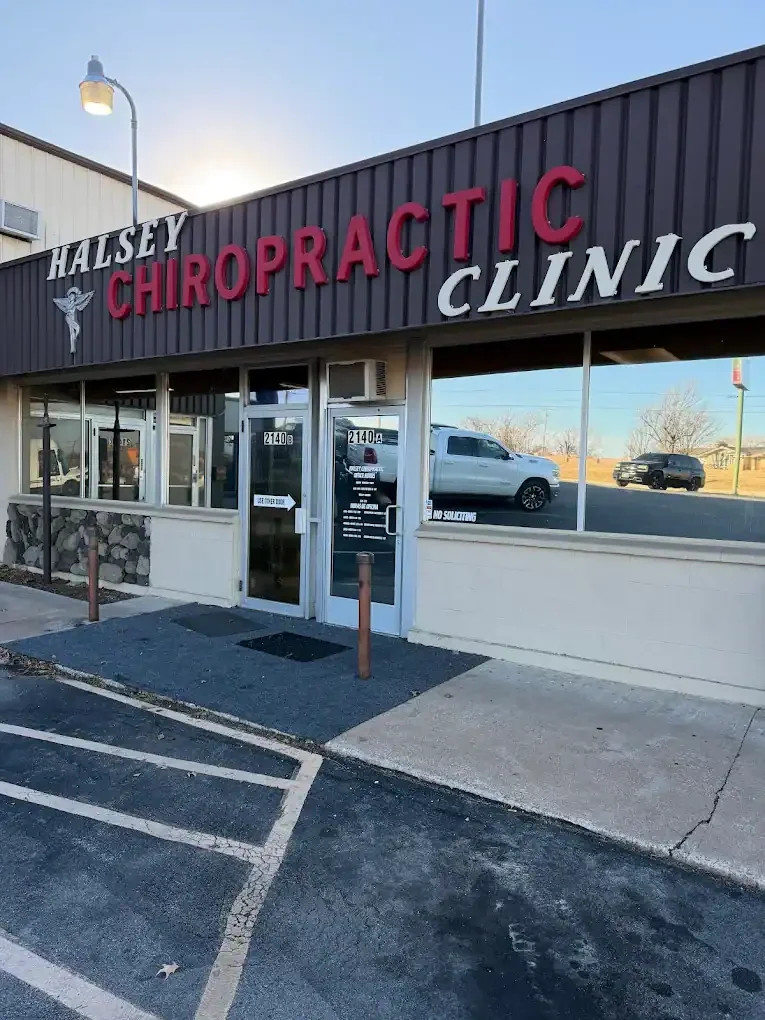 Halsey Chiropractic Clinic storefront sign above the office entrance on South Memorial Drive